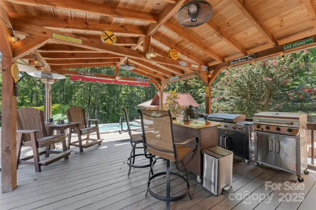 a view of a chairs and table in the patio