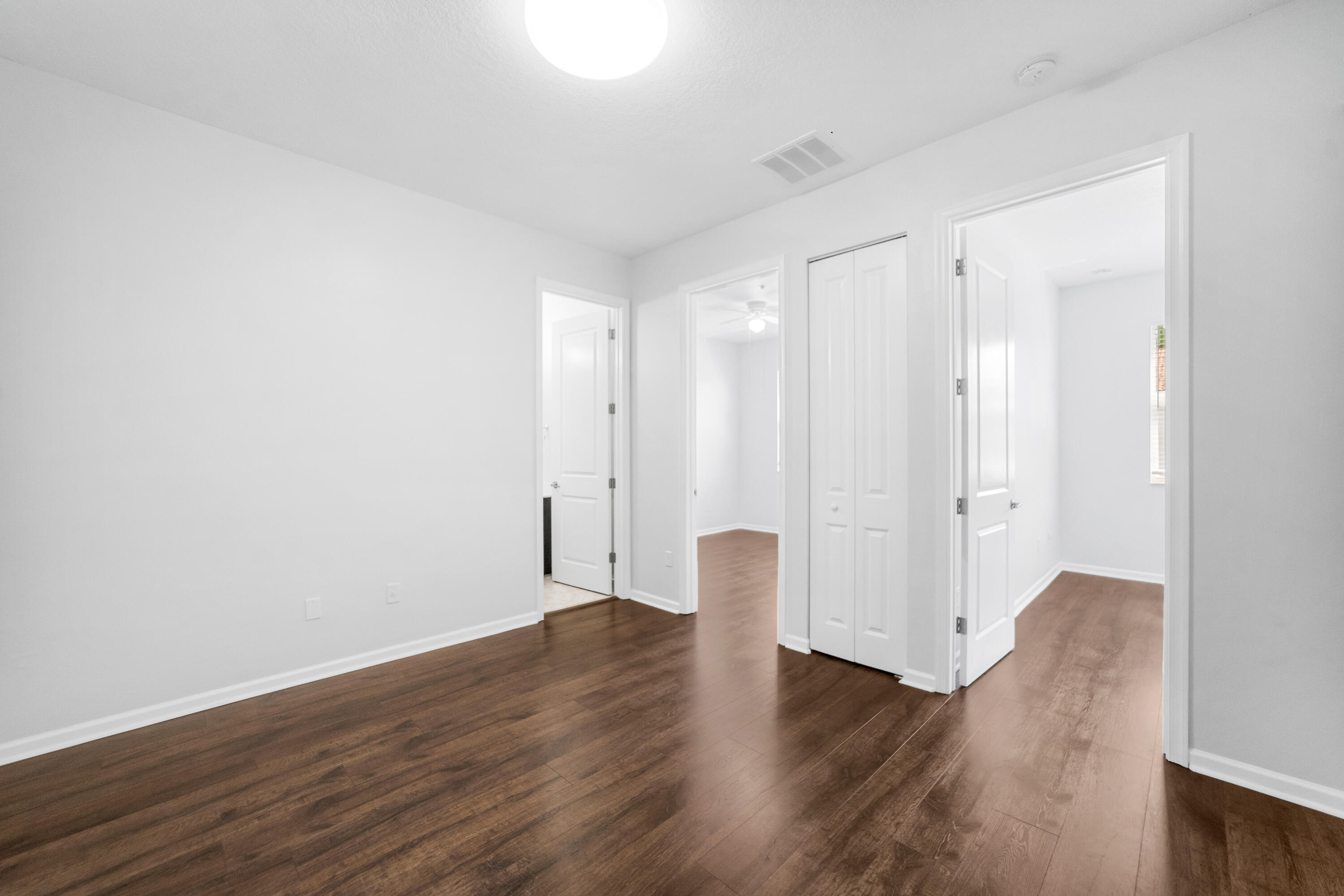 1430 Northwest 48th Lane Boca Raton, FL 33431 - Photo 16 of 54 a view of wooden floor and chair in a room