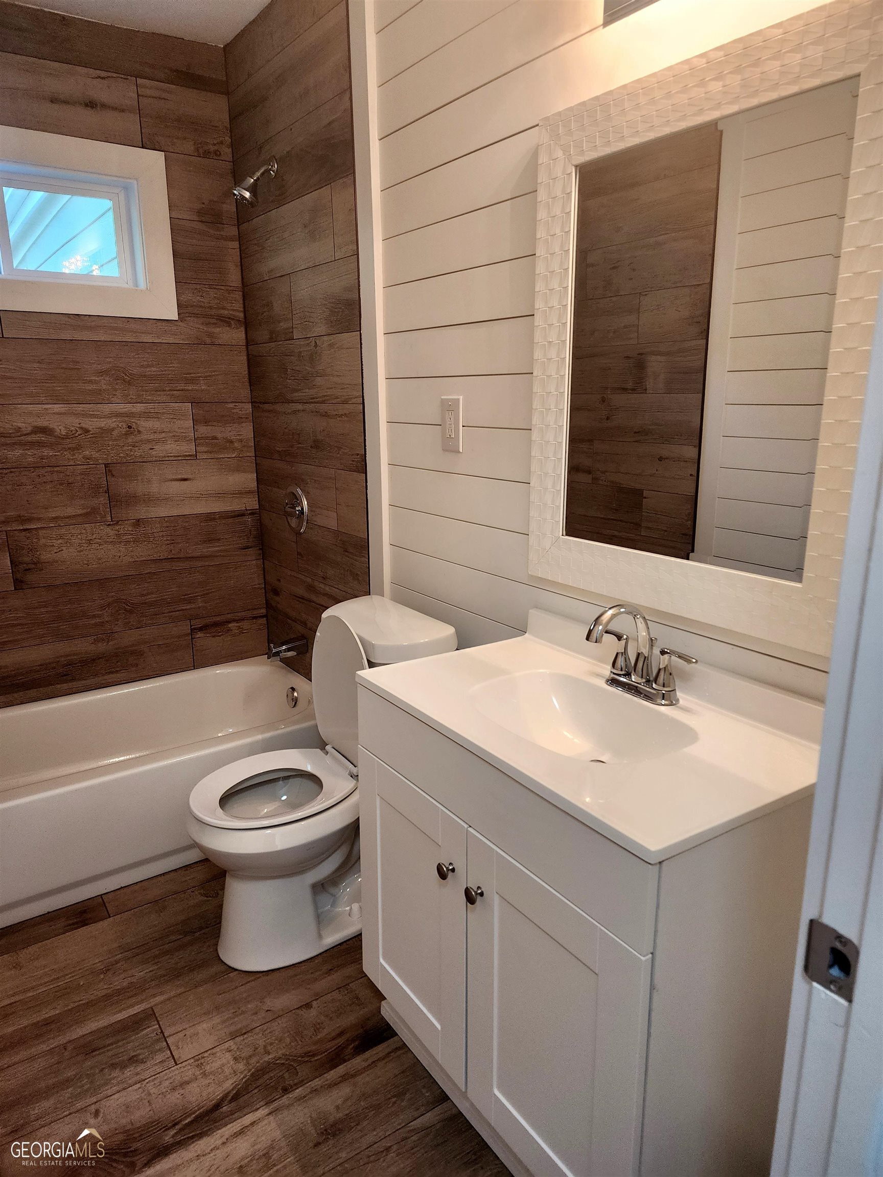 2577 Eastwood Drive Decatur, GA 30032 - Photo 11 of 21 a bathroom with a sink a toilet and shower