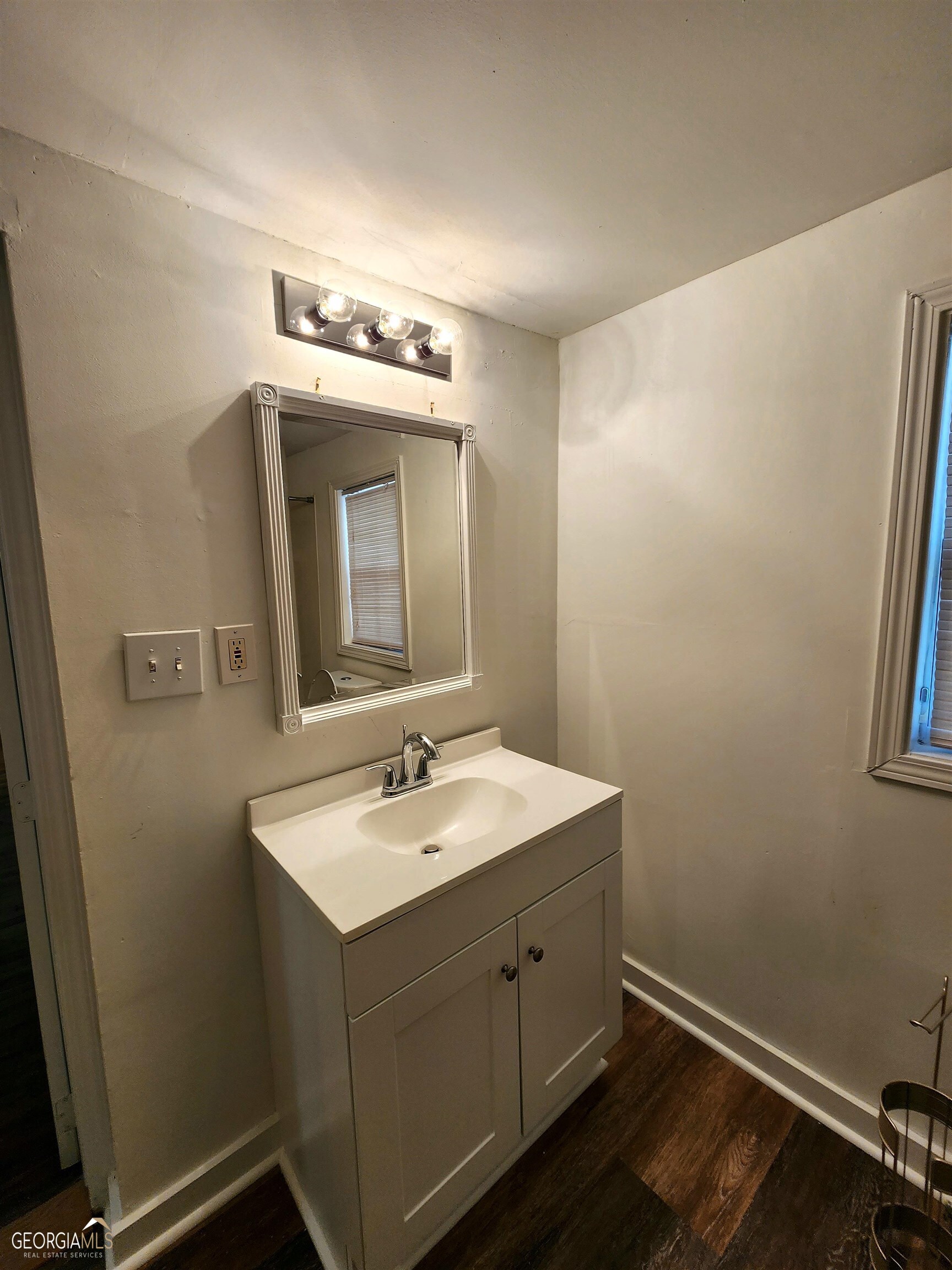 2577 Eastwood Drive Decatur, GA 30032 - Photo 17 of 21 a bathroom with a sink vanity and a mirror