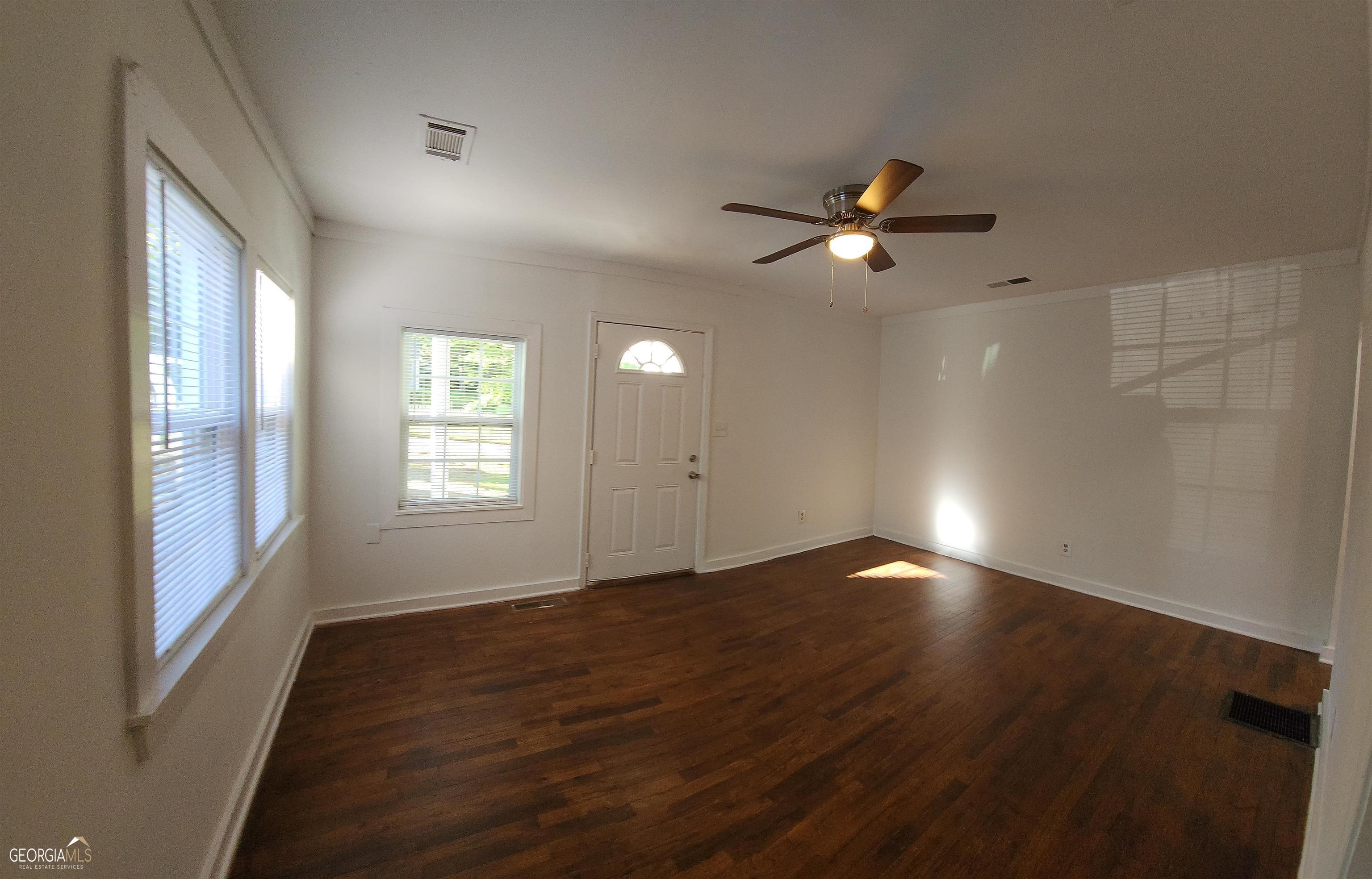 2577 Eastwood Drive Decatur, GA 30032 - Photo 4 of 21 wooden floor in an empty room with a window