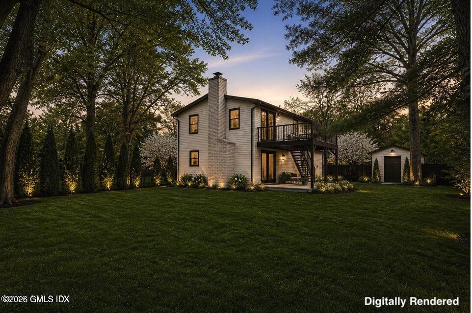 22 Carrona Drive Riverside, CT 06878 - Photo 22 of 26 a front view of a house with a garden