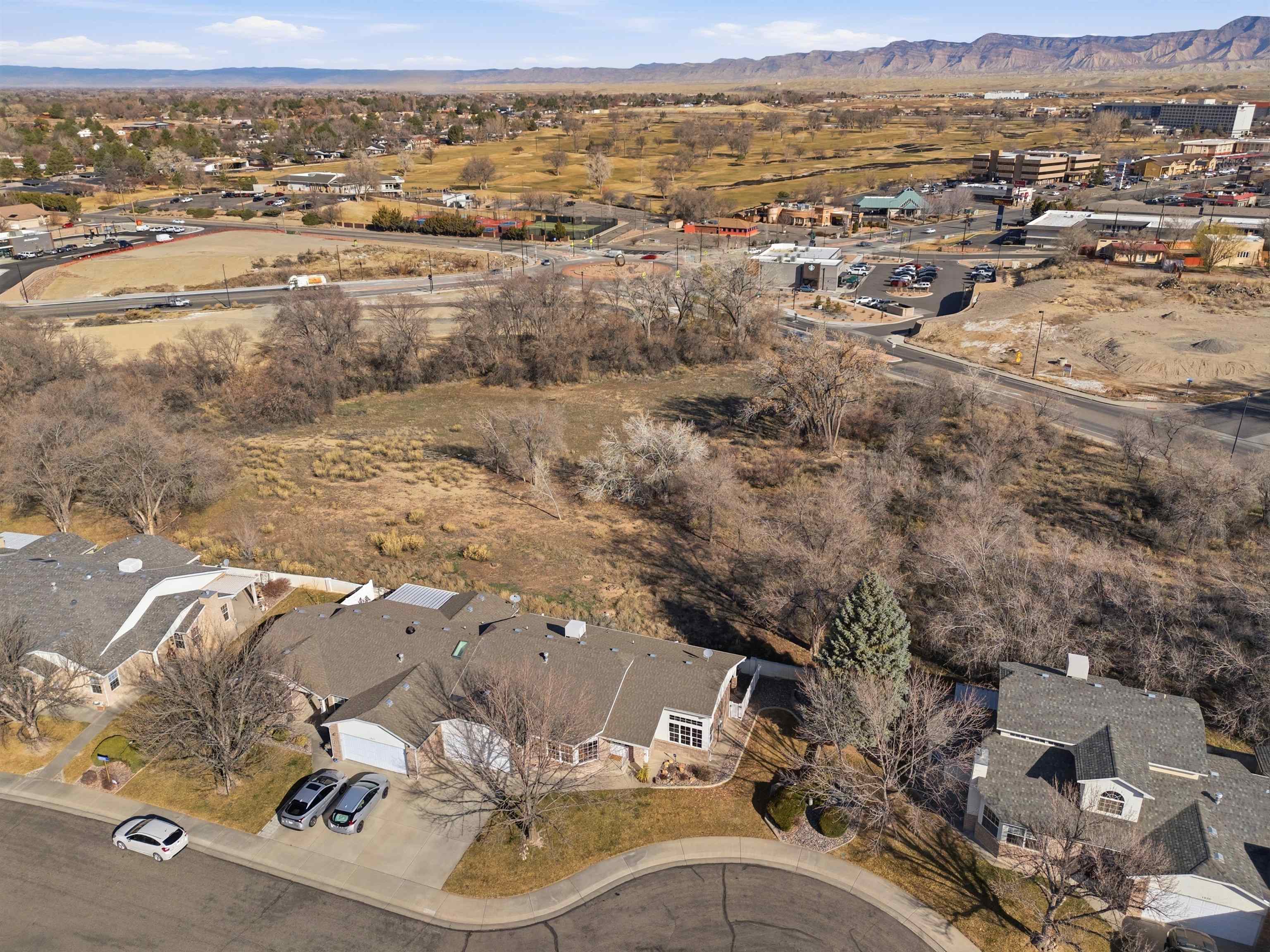 1820 Bittern Court Grand Junction, CO 81506 - Photo 26 of 28 an aerial view of a house with a mountain