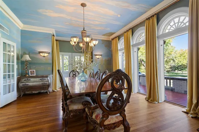 a kitchen with stainless steel appliances a sink and cabinets