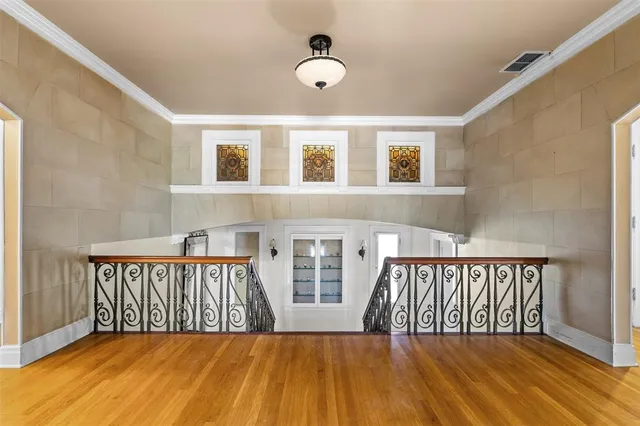 a front view of a house with seating space