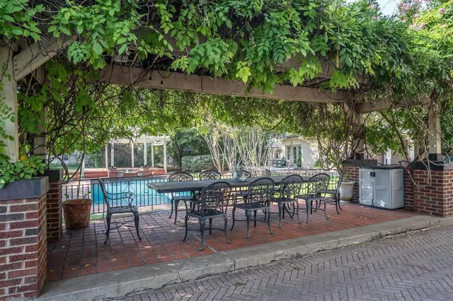 a view of a house with swimming pool