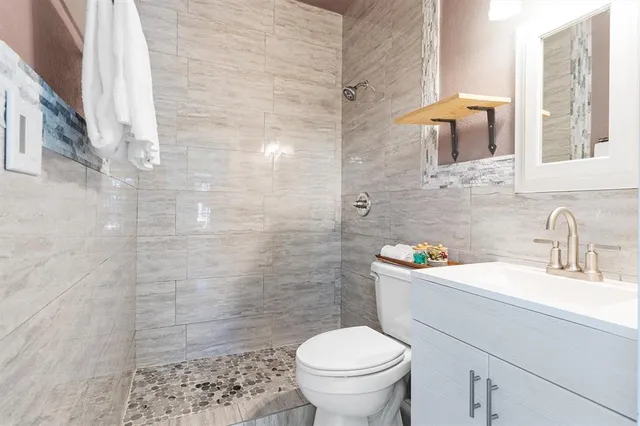 an aerial view of a house with yard and outdoor space