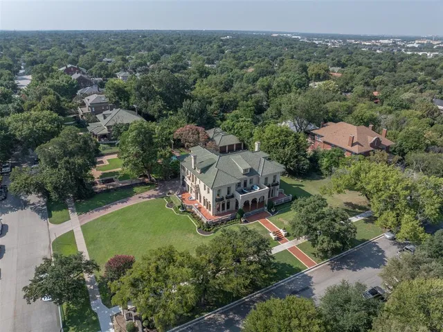 an aerial view of residential house with outdoor space and river