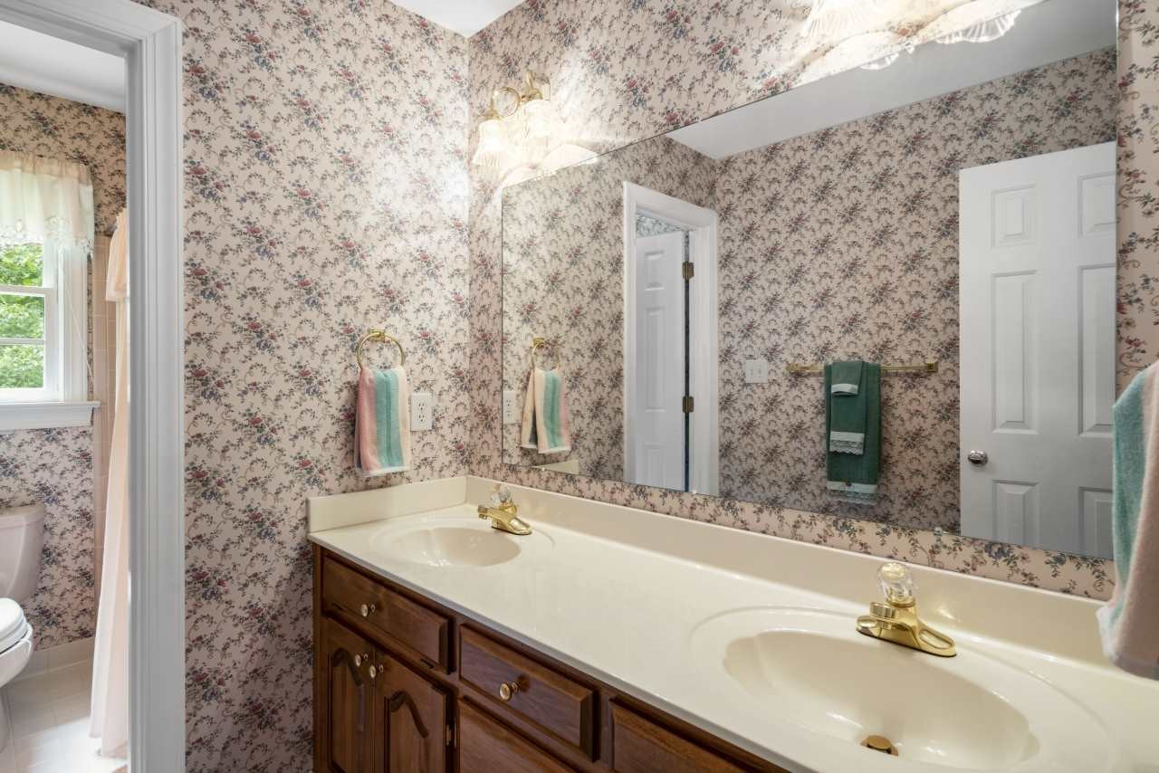 4125 Ridgebrook Bluffs Drive Raleigh, NC 27603 - Photo 24 of 30 Double Vanity in Hall Bath & Separate Shower Room