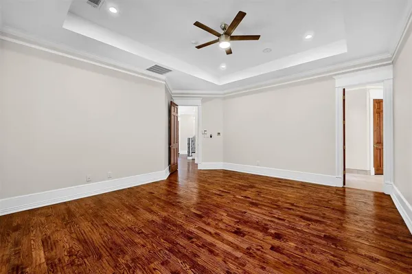 a bathroom with a bathtub sink and mirror