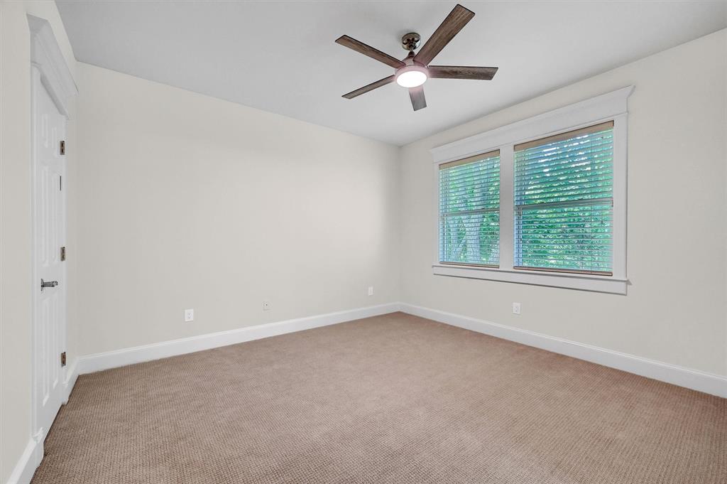 2910 Wellington Drive Sherman, TX 75092 - Photo 29 of 40 an empty room with a window and a fan