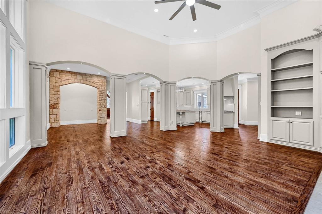 2910 Wellington Drive Sherman, TX 75092 - Photo 10 of 40 a view of a living room with hardwood floor and a ceiling fan
