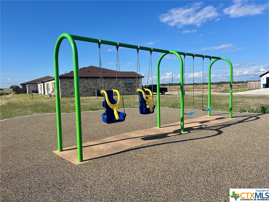 123 Aimable Street Port Lavaca, TX 77979 - Photo 2 of 4 a view of swimming pool with a patio