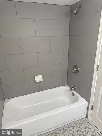 a bathroom with a tub