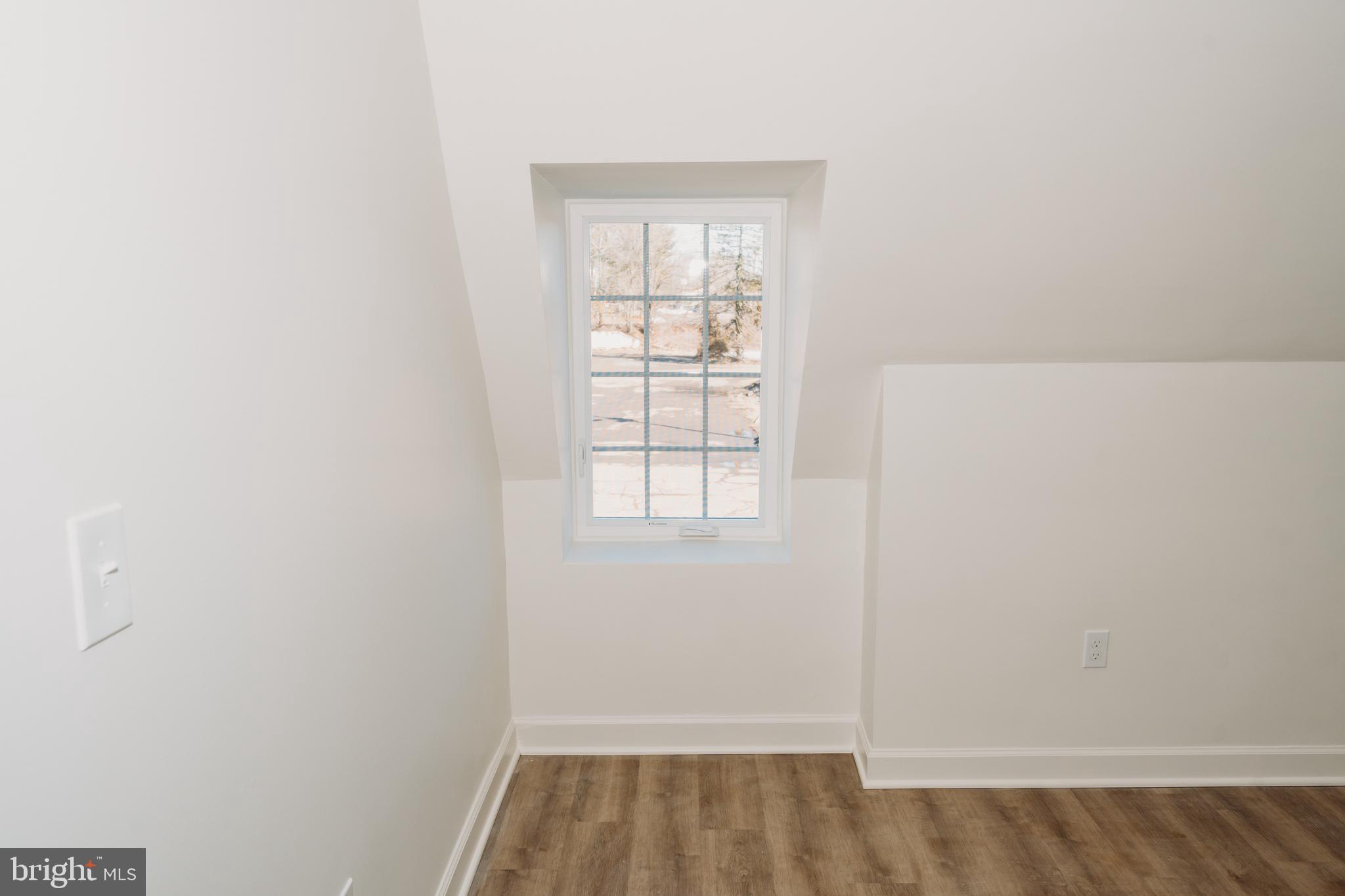 380 Broadview Avenue, Unit 2 Warrenton, VA 20186 - Photo 8 of 11 an empty room with a window