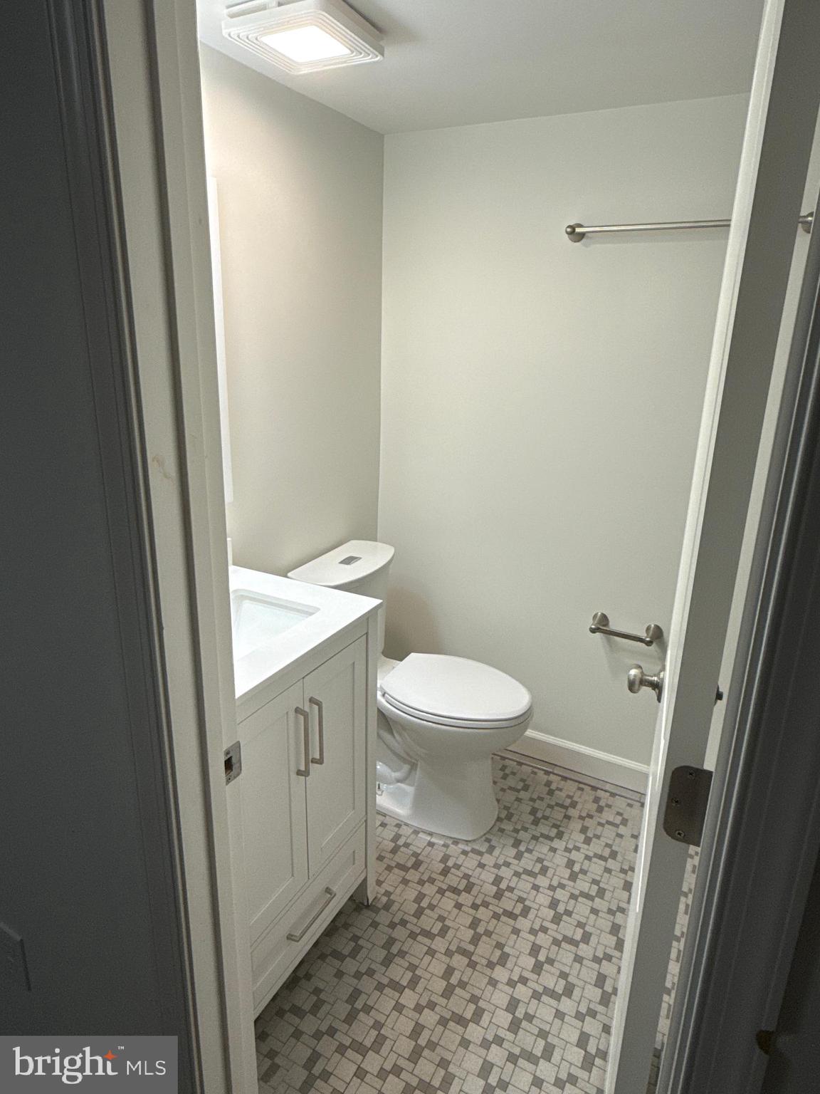 380 Broadview Avenue, Unit 2 Warrenton, VA 20186 - Photo 10 of 11 a bathroom with a toilet and a shower