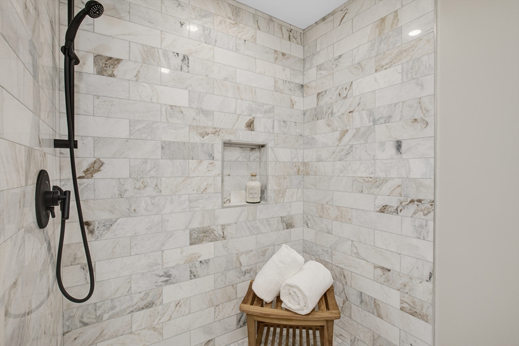 39 Middle Road, Unit A Newbury, MA 01951 - Photo 14 of 40 a bathroom with a toilet and a shower