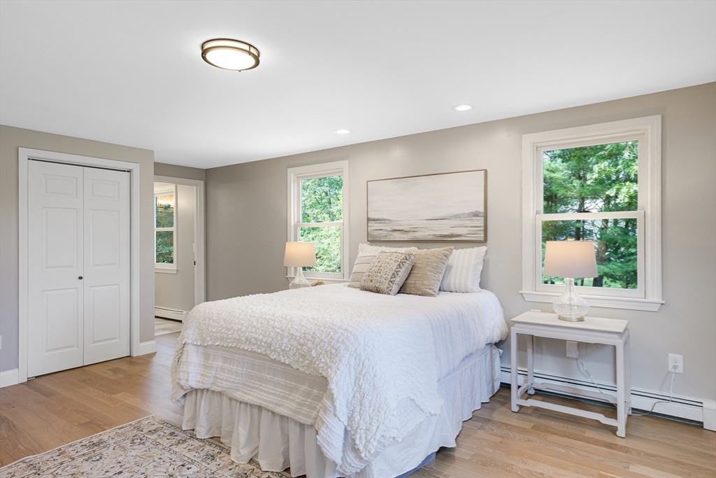 39 Middle Road, Unit A Newbury, MA 01951 - Photo 17 of 40 a bedroom with a bed and a window