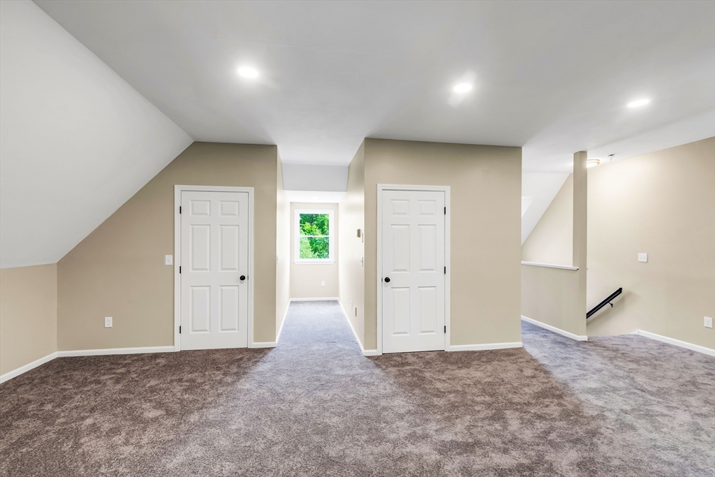 39 Middle Road, Unit A Newbury, MA 01951 - Photo 34 of 40 an empty room with a natural light