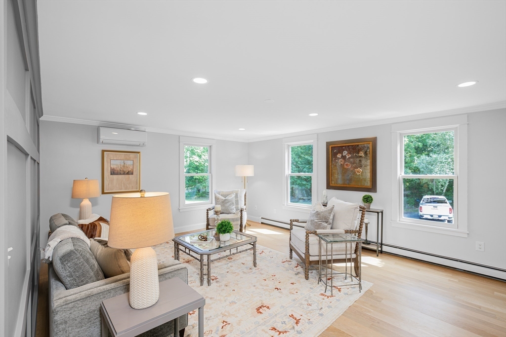 39 Middle Road, Unit A Newbury, MA 01951 - Photo 6 of 40 a living room with furniture and a window