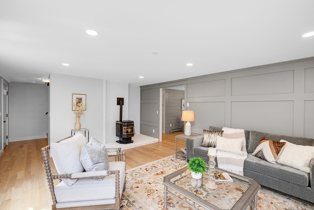 39 Middle Road, Unit A Newbury, MA 01951 - Photo 8 of 40 a living room with furniture and wooden floor