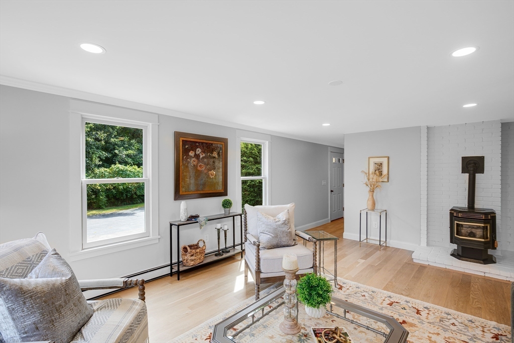 39 Middle Road, Unit A Newbury, MA 01951 - Photo 9 of 40 a living room with furniture and a flat screen tv