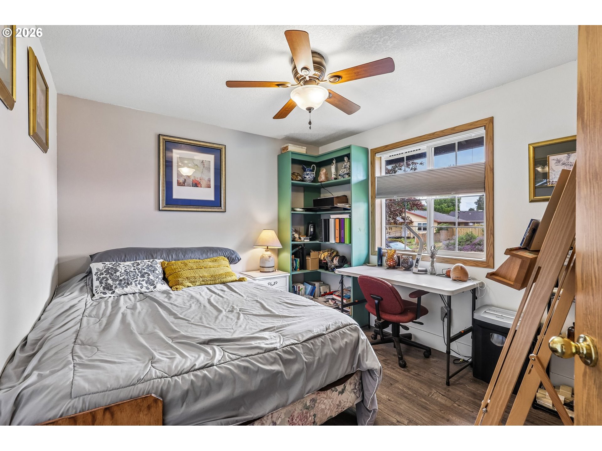 608 Southeast Sumner Street Camas, WA 98607 - Photo 16 of 39 a bed room with a bed and a window