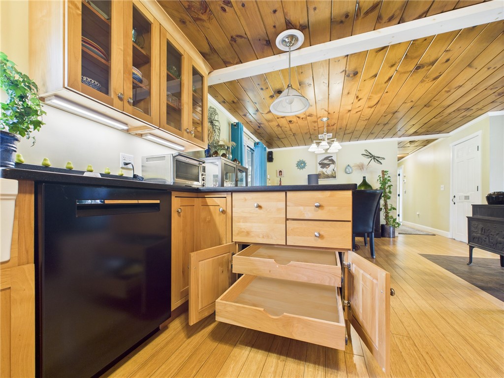 95 Mail Road Exeter, RI 02822 - Photo 13 of 33 The kitchen remodel provides plenty of cabinetry. Pullouts abound.