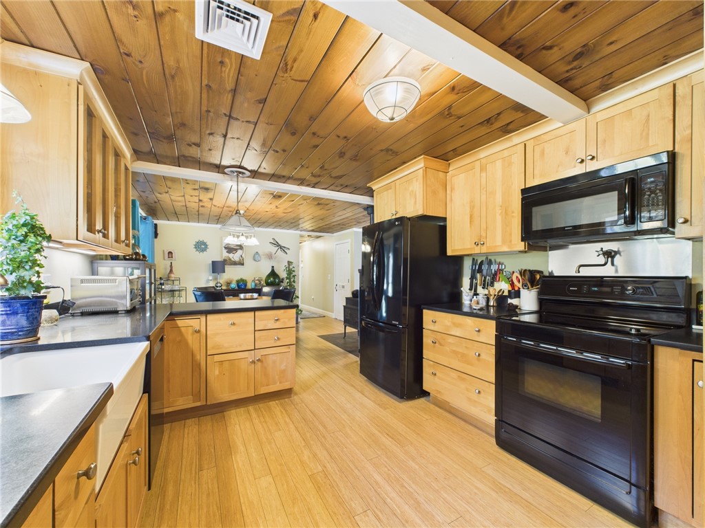 95 Mail Road Exeter, RI 02822 - Photo 16 of 33 Note the array of drawers of all sizes in this marvelous kitchen. There's even a spigot over the stove for the pasta and lobster pans! In this room, the Dining room and LR there are pre-wired speakers creating surround sound of your favorite CD selections!