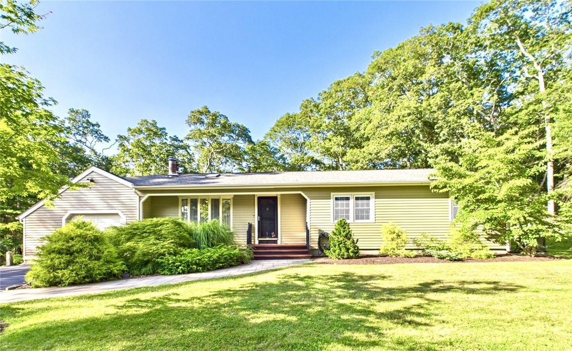 95 Mail Road Exeter, RI 02822 - Photo 2 of 33 Can you say "curb appeal"? This custom 7 room, 3 bed 1751sf ranch is larger than appears at front view. There is a 20x19 FR behind the 19x22 garage. A master gardener's skill is evinced in the.96 acre's colorful display of plantings. Wide, walnut stained stairs complement a black noir entry door, a prelude to the artistry within.