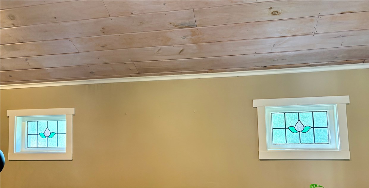 95 Mail Road Exeter, RI 02822 - Photo 26 of 33 Two charming and authentic stained glass windows grace this breathtaking room also.