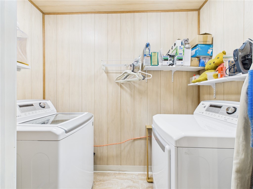 95 Mail Road Exeter, RI 02822 - Photo 27 of 33 1st FLR laundry room off the FR has space to hang clothes and strategic shelving.
