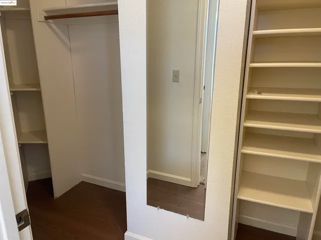 a view of an empty walk in closet