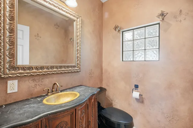 a view of a livingroom with wooden furniture