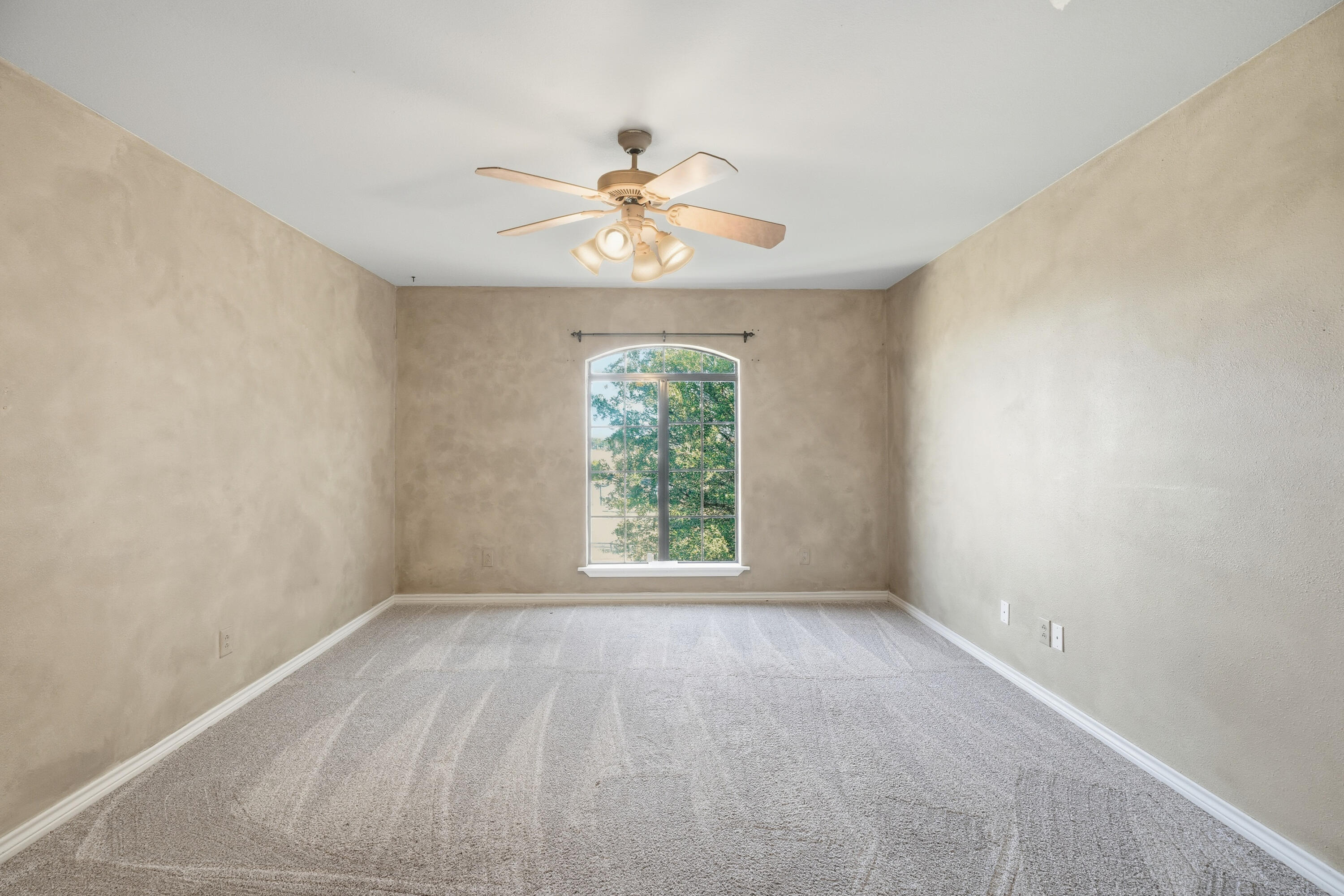 5601 County Road 7920 Lubbock, TX 79424 - Photo 31 of 68 wooden floor in an empty room with a window