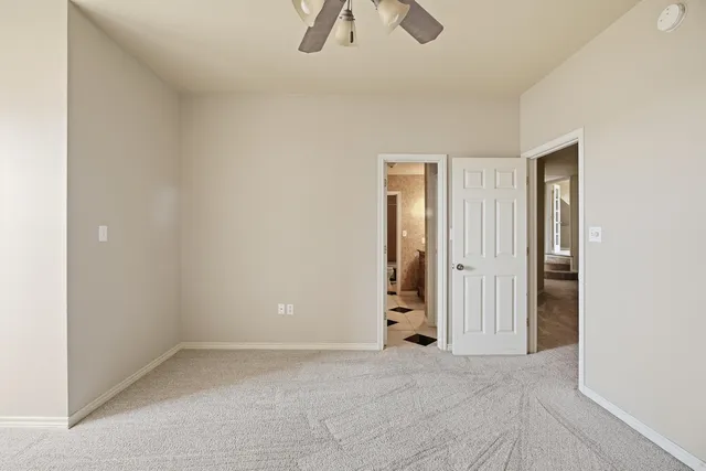 a kitchen with stainless steel appliances white cabinets and a sink