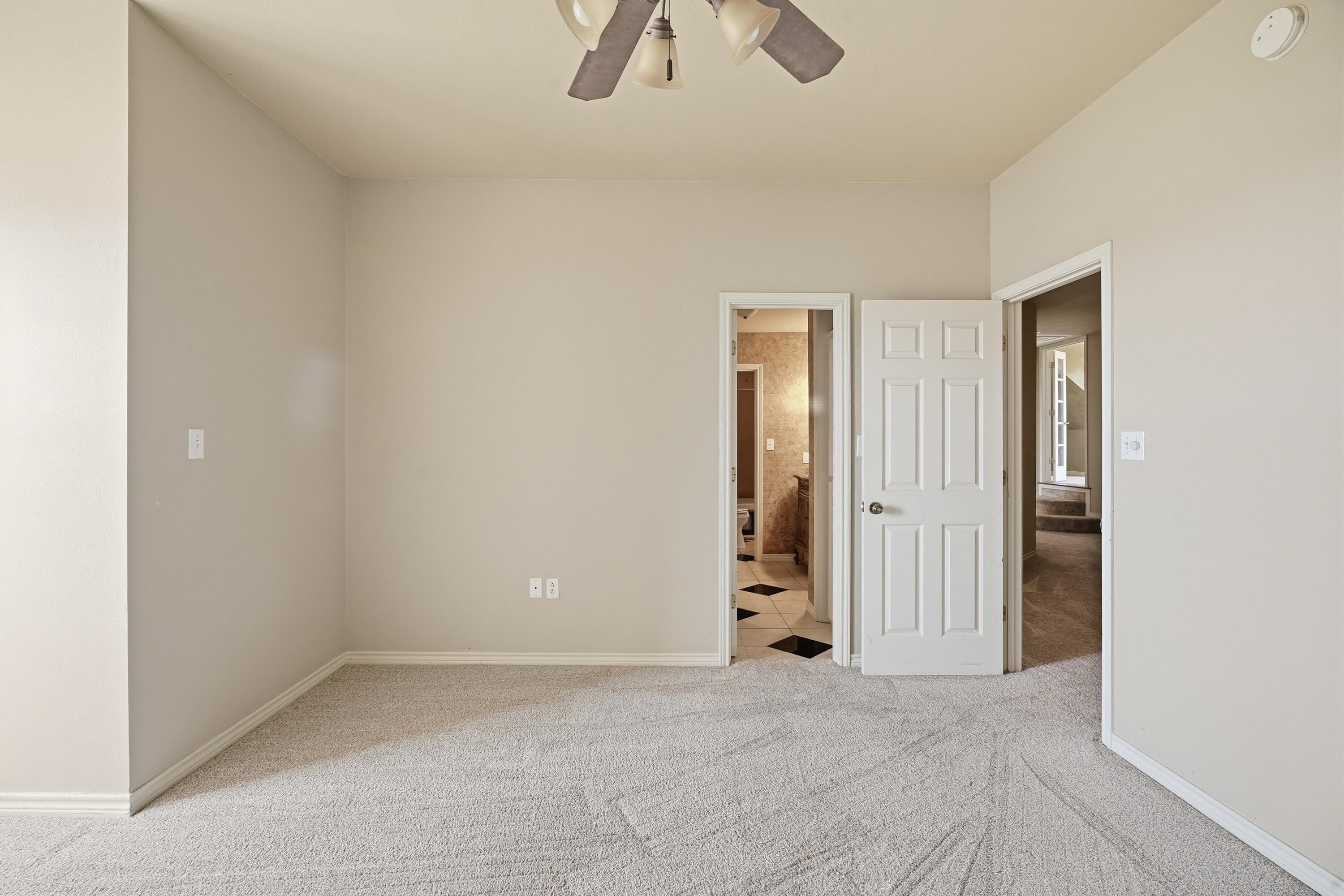 5601 County Road 7920 Lubbock, TX 79424 - Photo 35 of 68 an empty room with view of closet