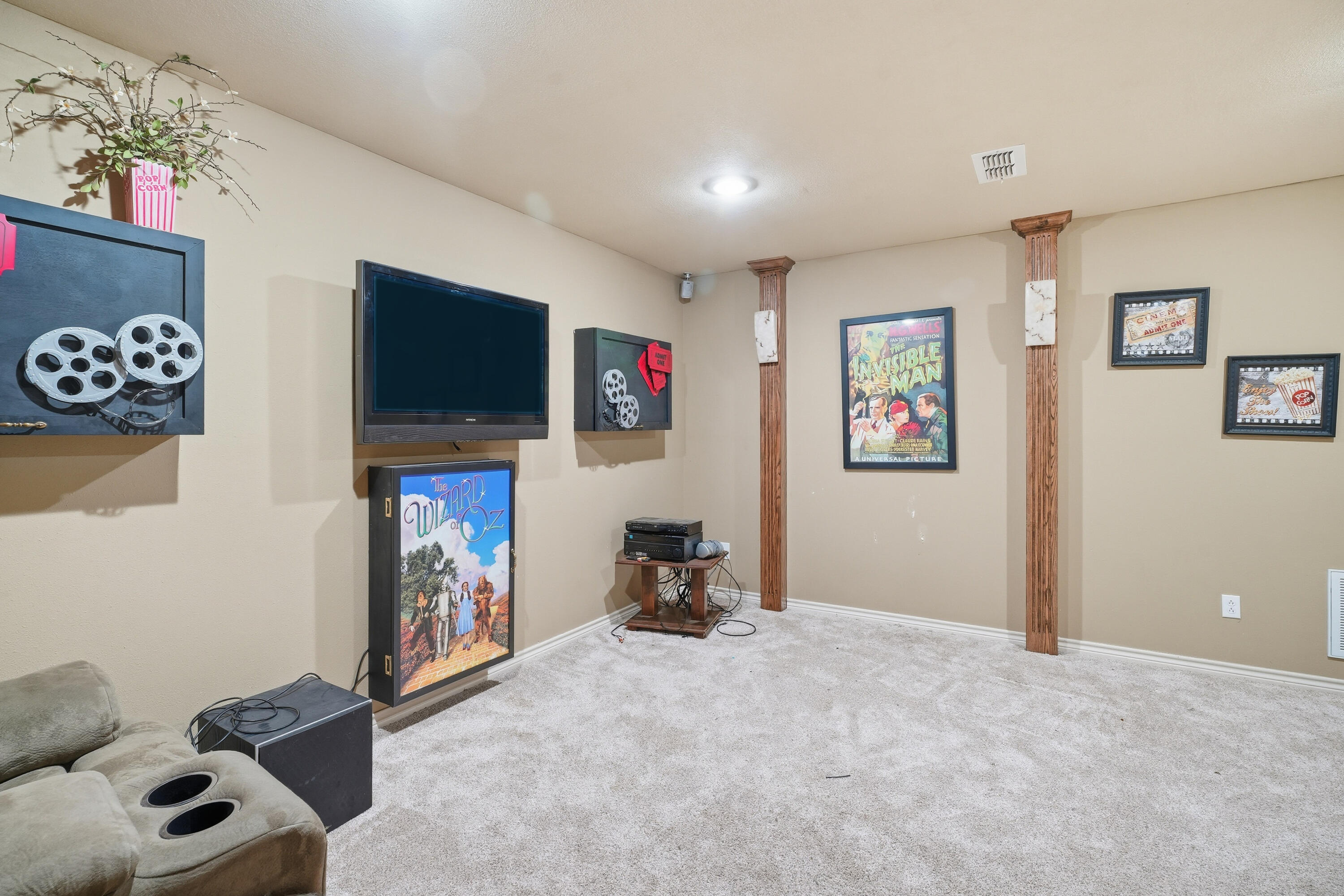 5601 County Road 7920 Lubbock, TX 79424 - Photo 47 of 68 a room with furniture and a flat screen tv