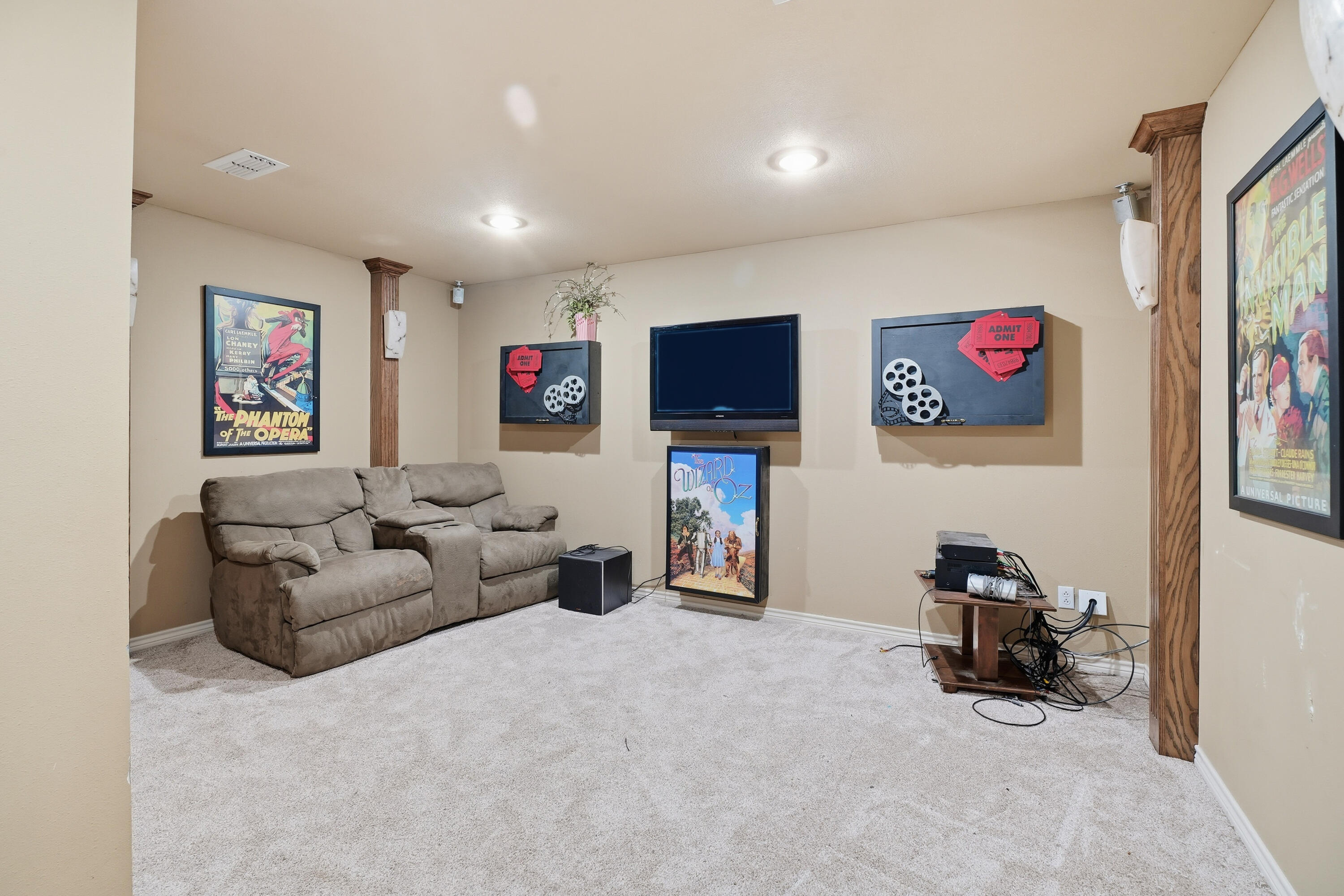 5601 County Road 7920 Lubbock, TX 79424 - Photo 48 of 68 a living room with furniture and a flat screen tv