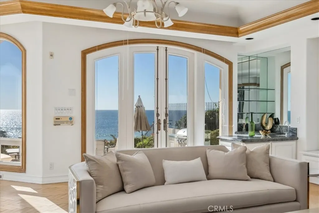 21 Ritz Cove Drive Dana Point, CA 92629 - Photo 16 of 72 a living room with furniture and a large window