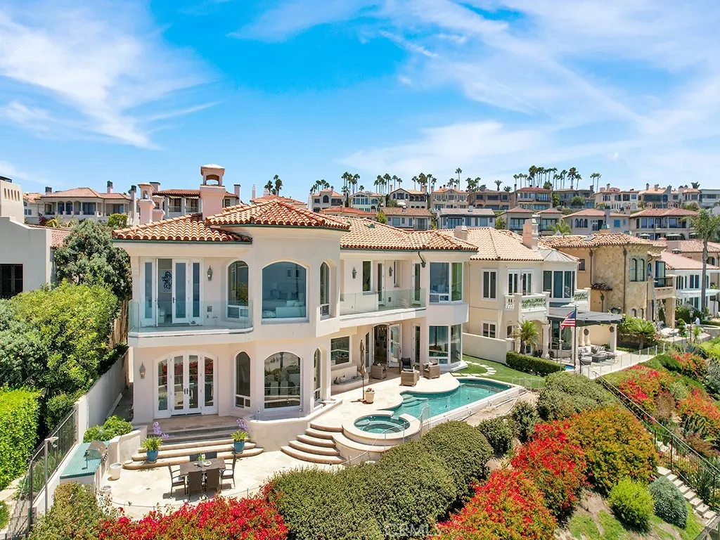 21 Ritz Cove Drive Dana Point, CA 92629 - Photo 22 of 72 a view of a big building with a big yard and large trees