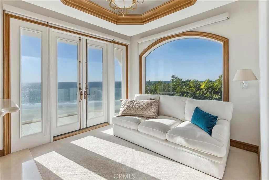 21 Ritz Cove Drive Dana Point, CA 92629 - Photo 37 of 72 a living room with furniture and a large window