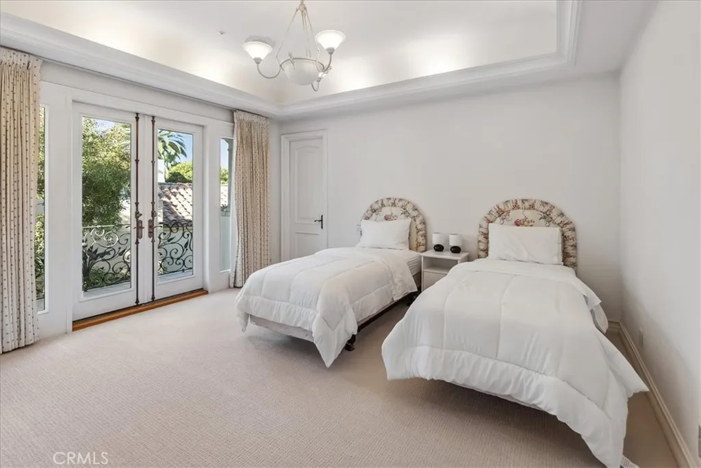 21 Ritz Cove Drive Dana Point, CA 92629 - Photo 43 of 72 a spacious bedroom with two bed and a large window