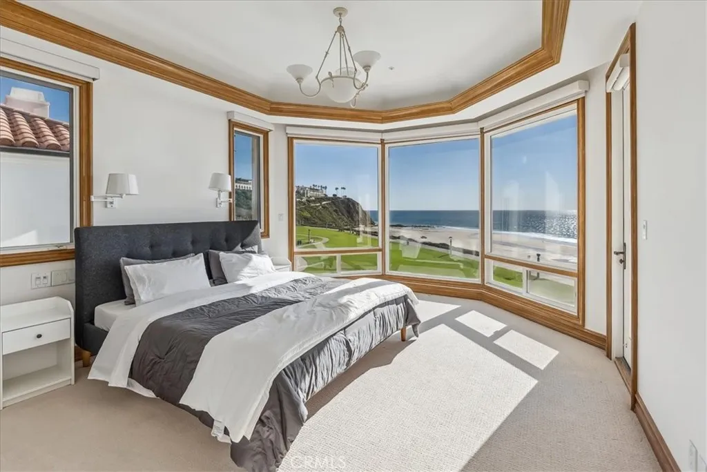 21 Ritz Cove Drive Dana Point, CA 92629 - Photo 44 of 72 a bed sitting in a bedroom next to a window