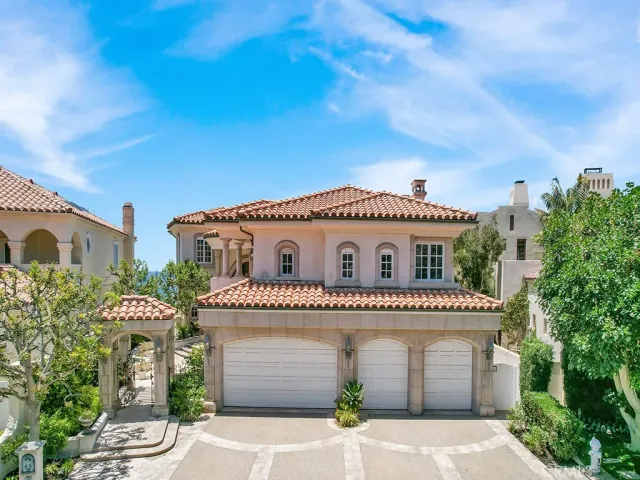 a view of a swimming pool with a lounge chairs