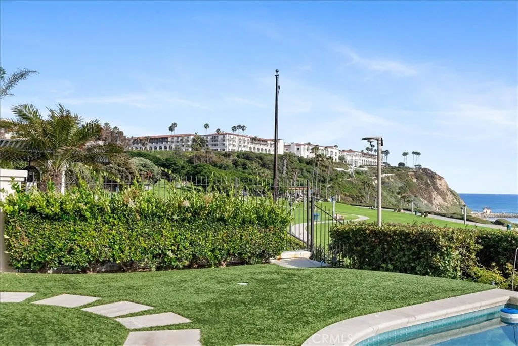 21 Ritz Cove Drive Dana Point, CA 92629 - Photo 61 of 72 a view of a garden with a building in the background