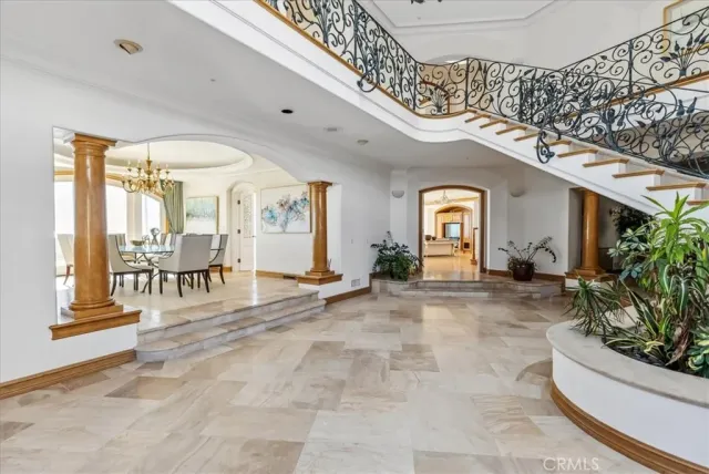 a kitchen with granite countertop a sink and cabinets