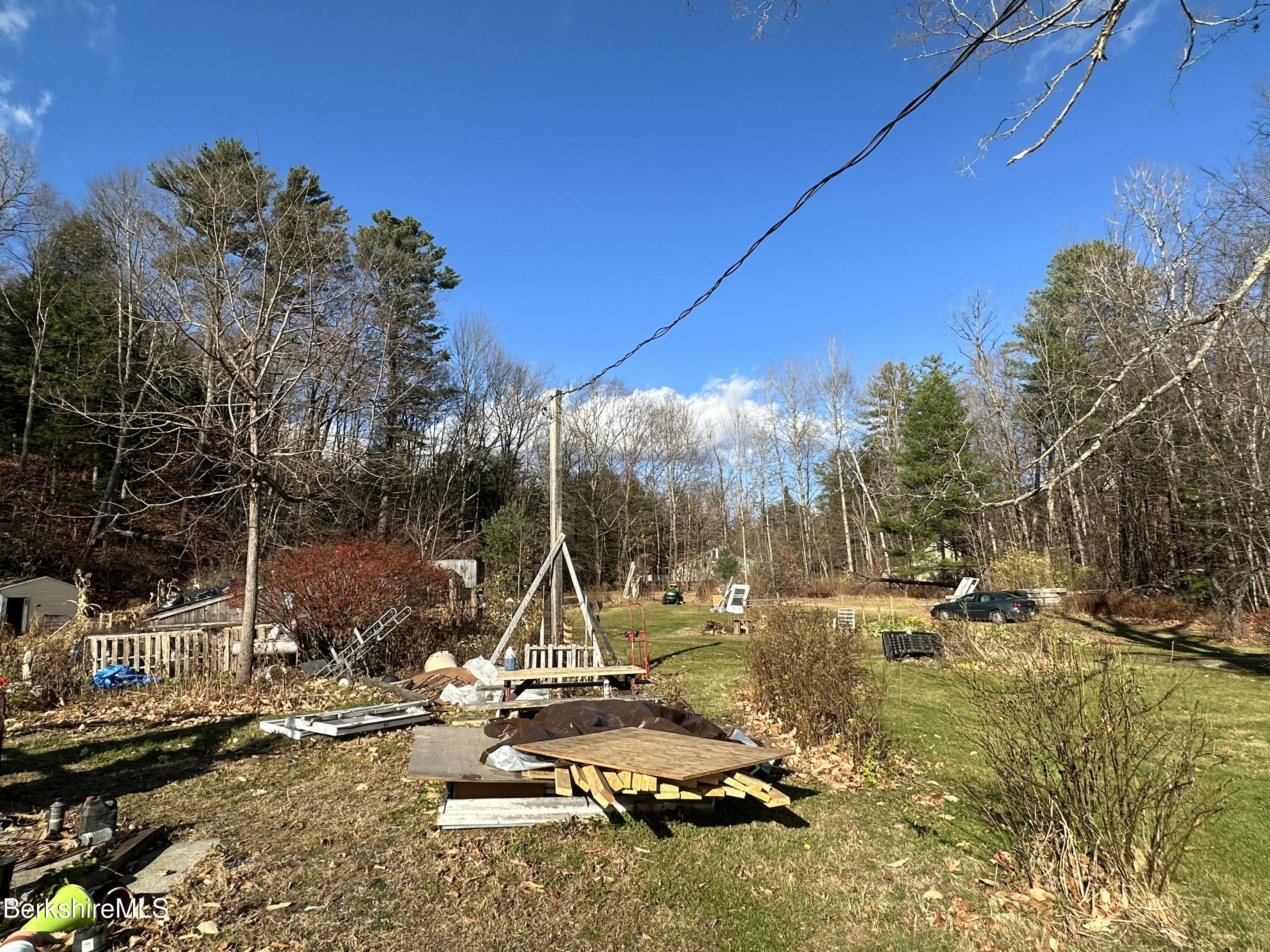 471 Middle Road Clarksburg, MA 01247 - Photo 8 of 9 a view of a lake with a slide