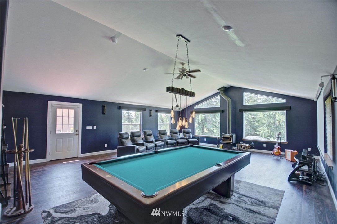 21741 Michigan Hill Road Southwest Rochester, WA 98579 - Photo 11 of 27 a room with pool table and windows