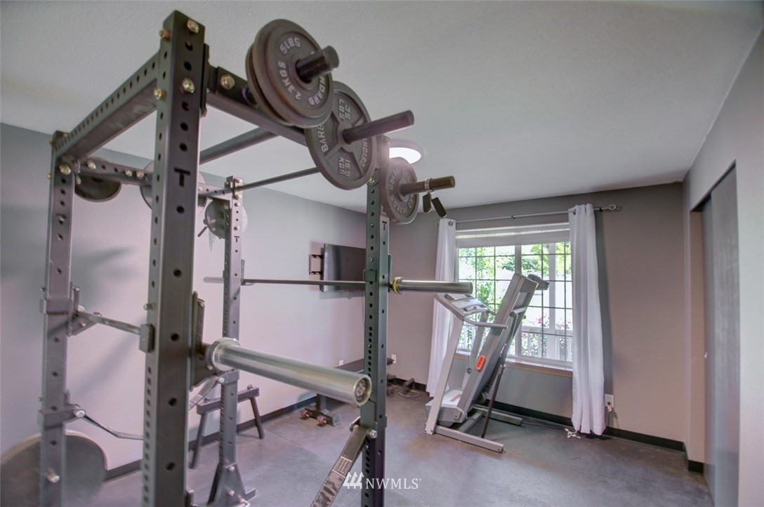 21741 Michigan Hill Road Southwest Rochester, WA 98579 - Photo 16 of 27 a view of a room with gym equipment